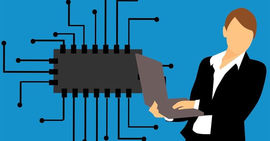 Eine Illustration zeigt eine Frau mit Laptop im Vordergrund und einen Halbleiter im HIntergrund.